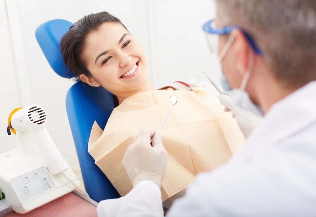 dentist with patient